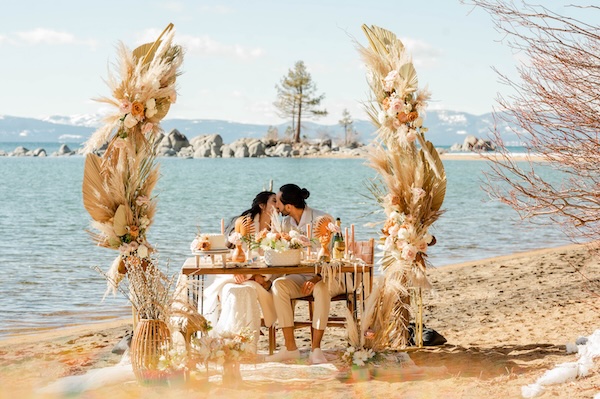 kissing bride and groom at lake tahoe